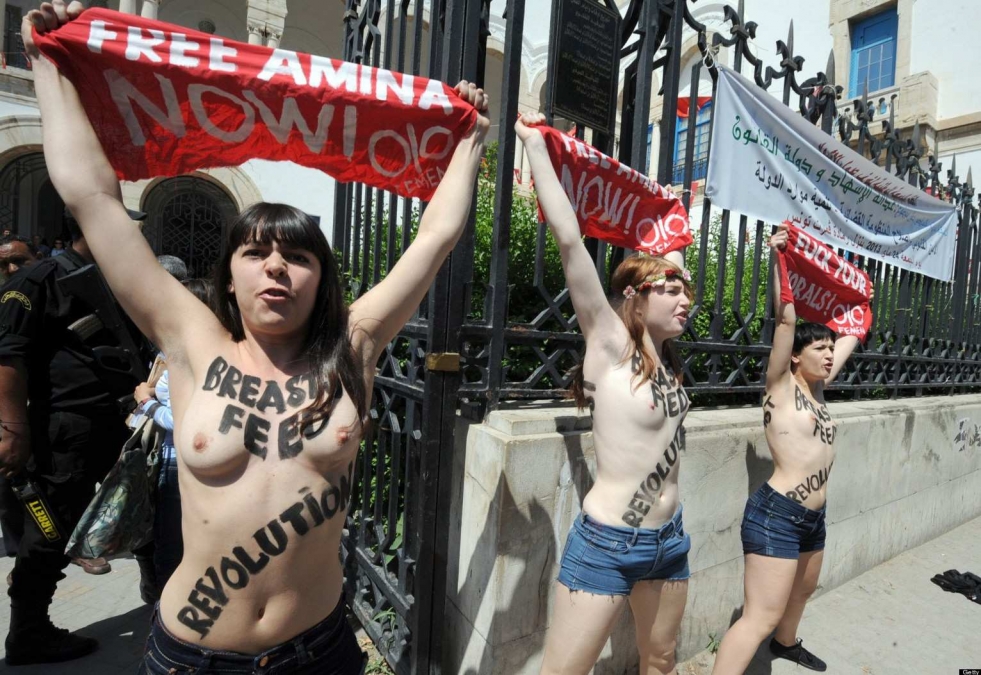 Parade of feminist with bare breasts