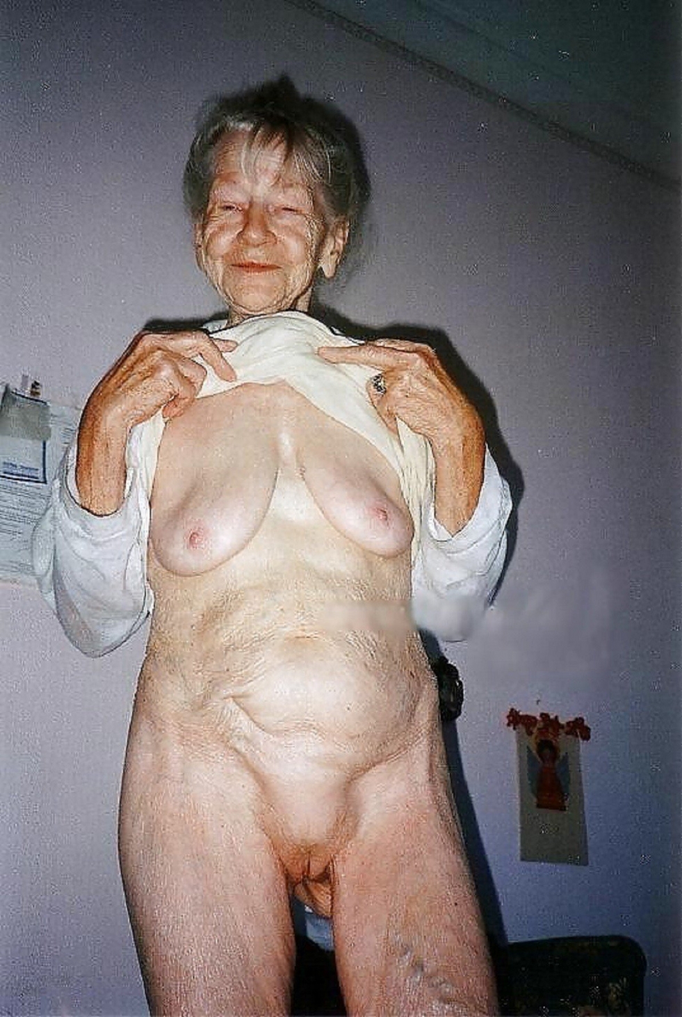 Old sagging boobs grandmother