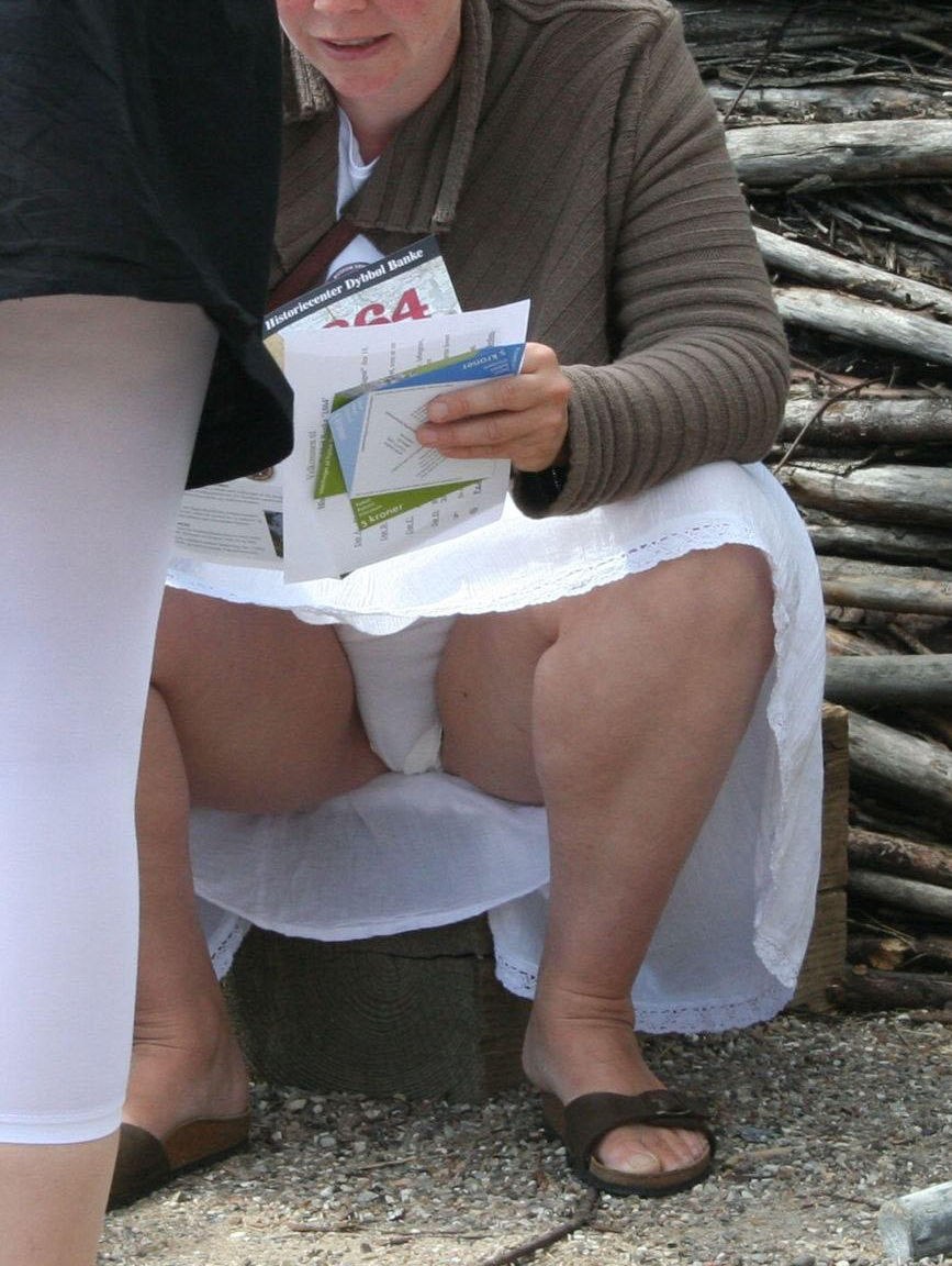 Panties under squatting skirt