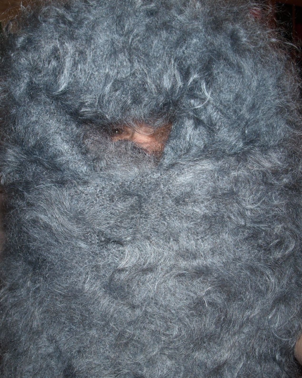 Woman in a down shawl naked