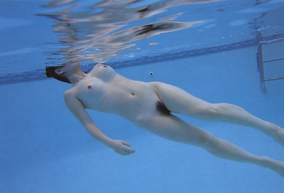 Naked tits under water