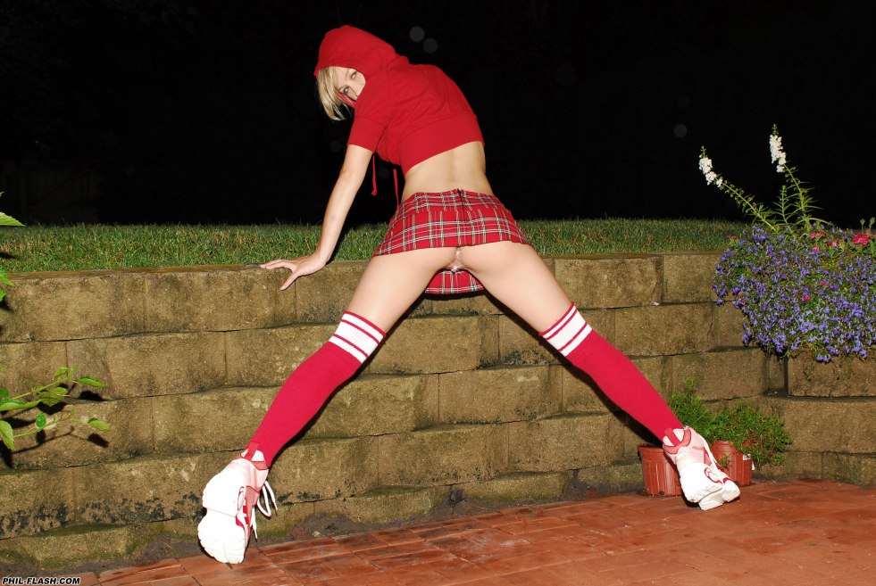 Red hat in a small mini skirt without panties