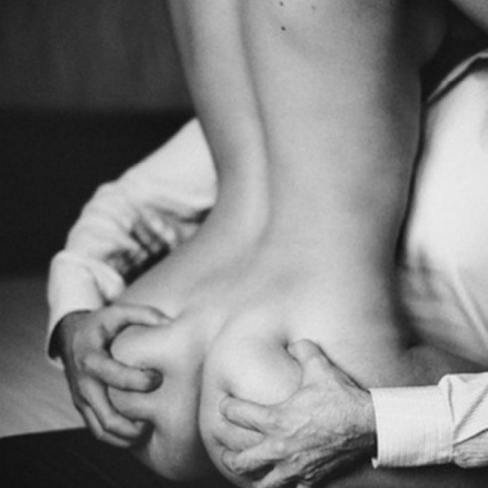 Men's hand on female chest