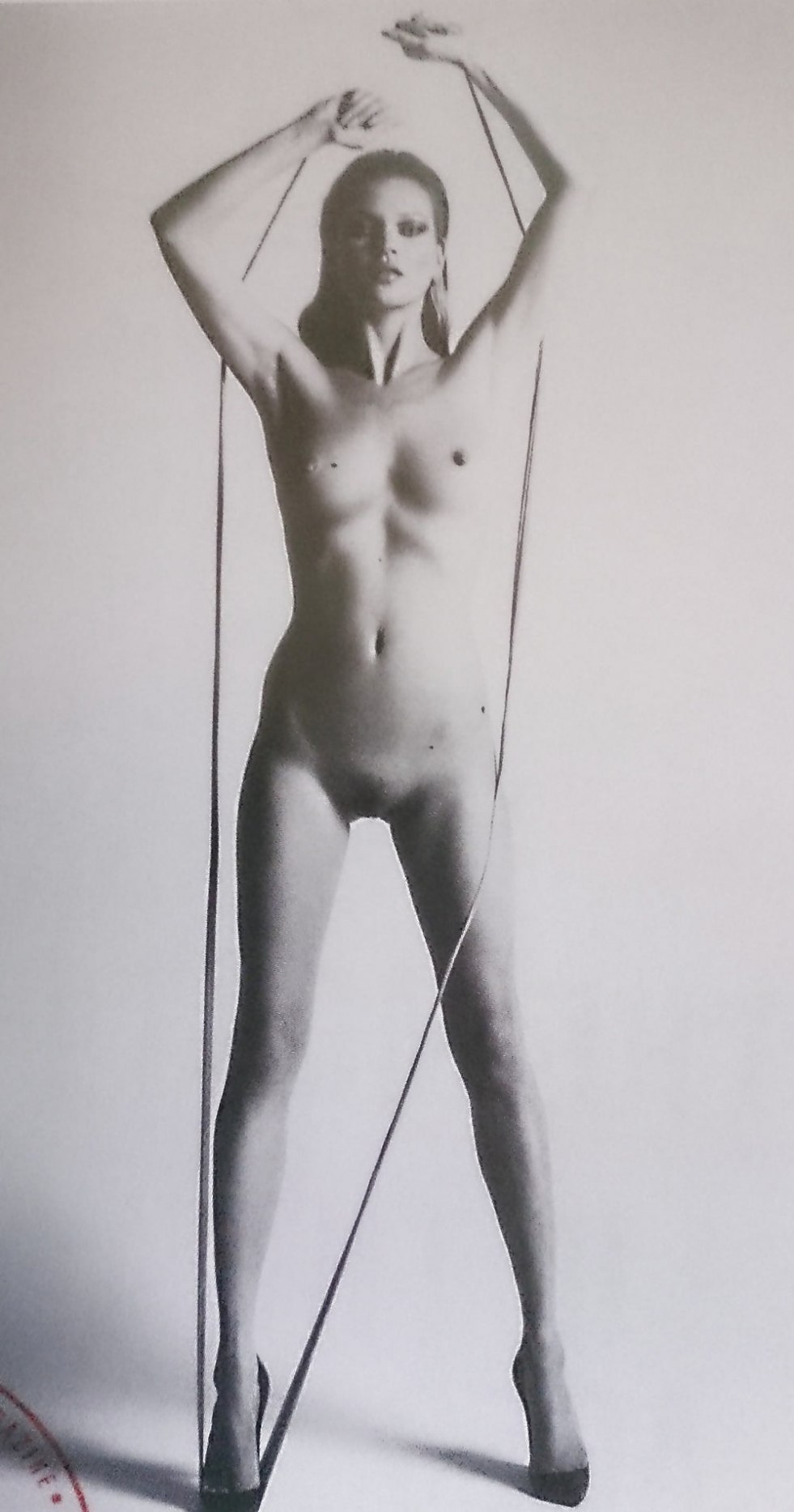 Stock Foto Kate Moss naked on bed with