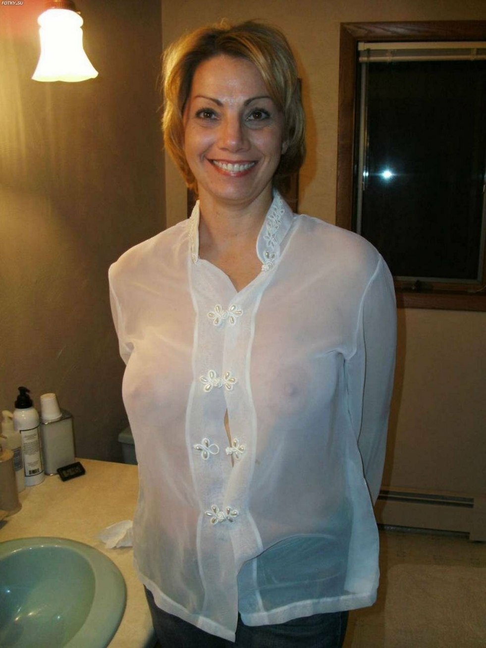 Women in transparent blouses without a bra