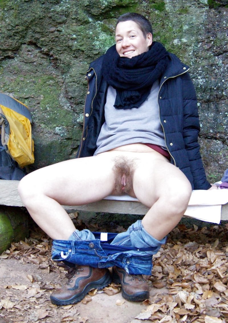 Bare women and men in nature