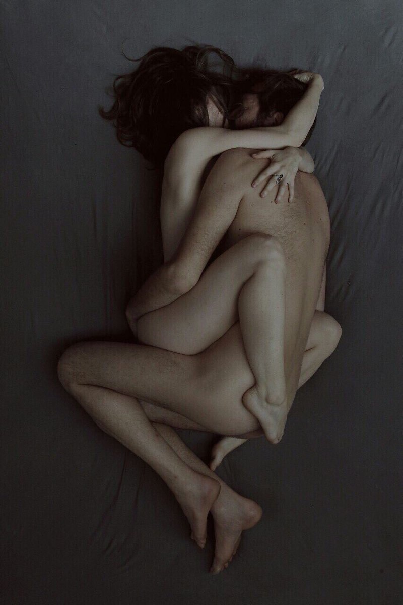 Naked man and woman hugging