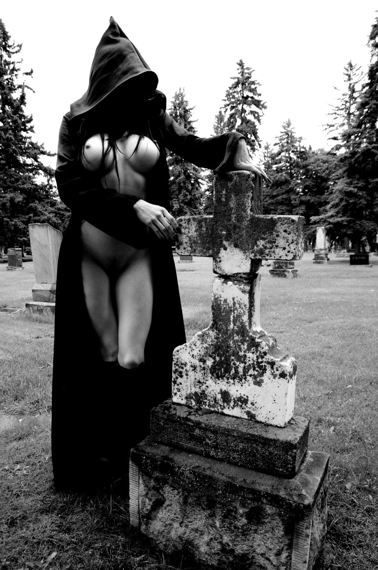 Naked photo session in the cemetery