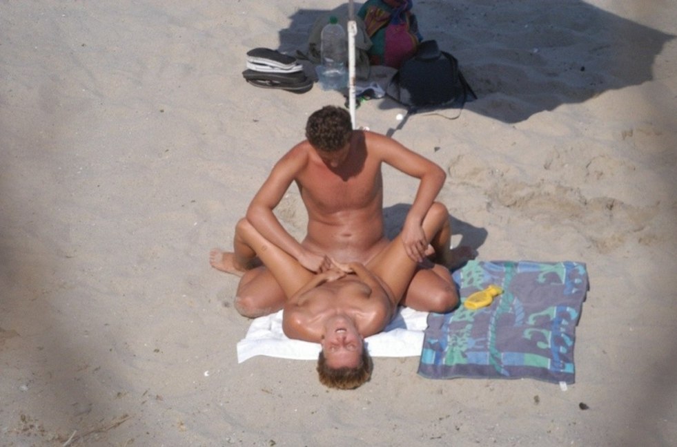 Drunk naked women on the beach