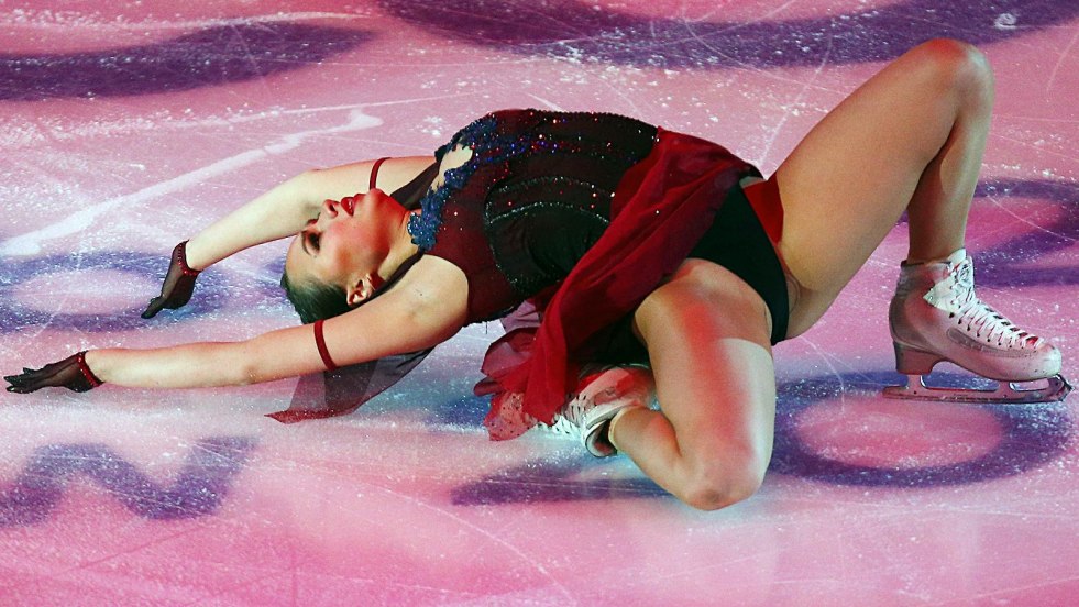 Spicy photo figure skater on ice
