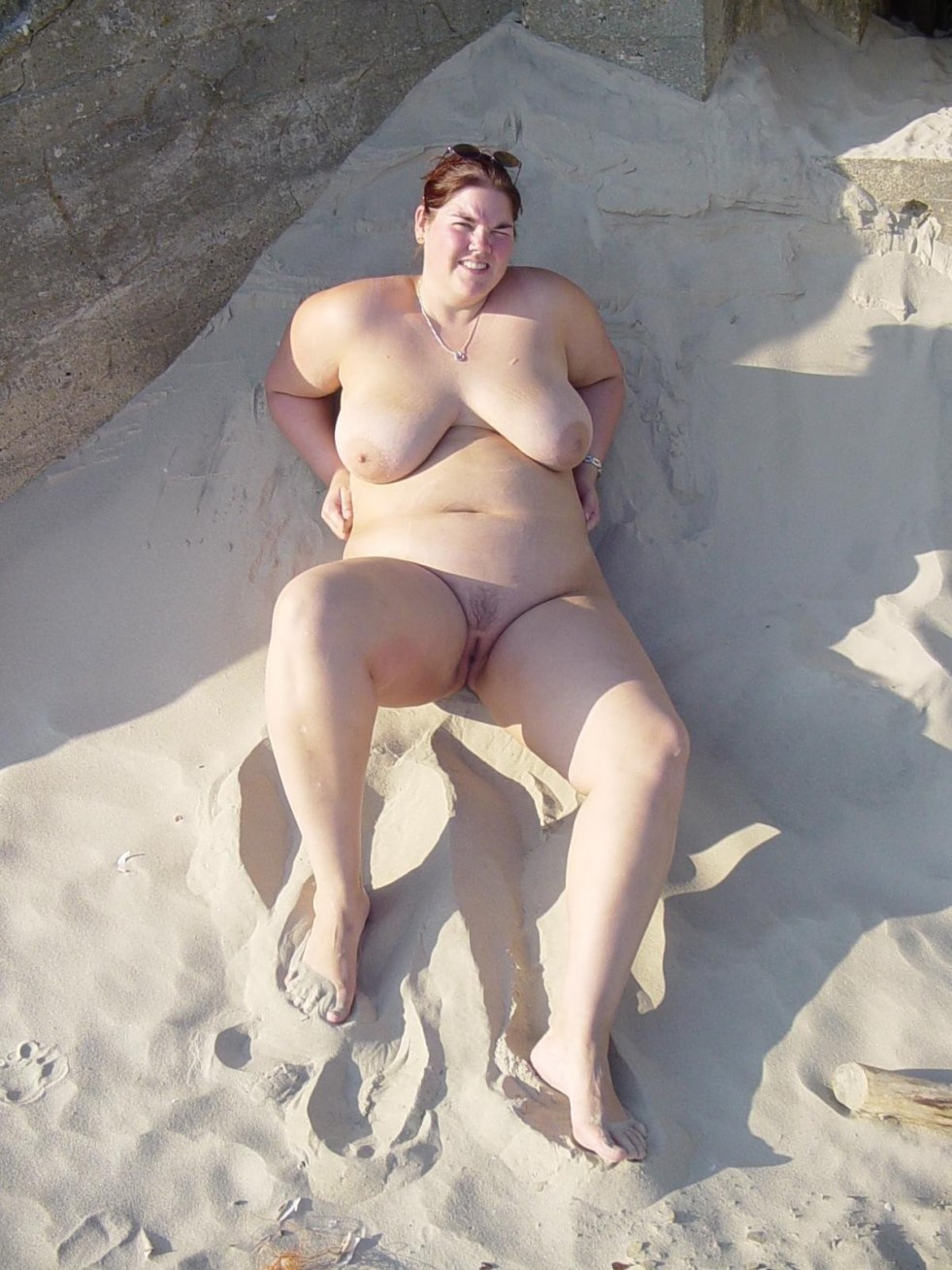 Naked mature fat fat on the beach