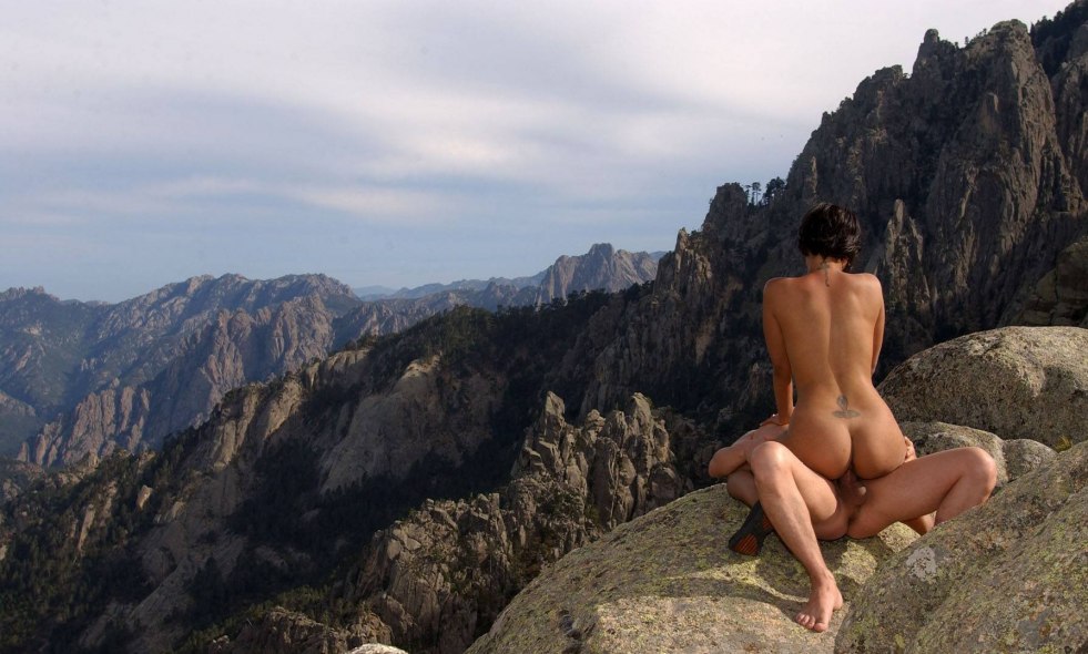 Naked man and woman in the mountains