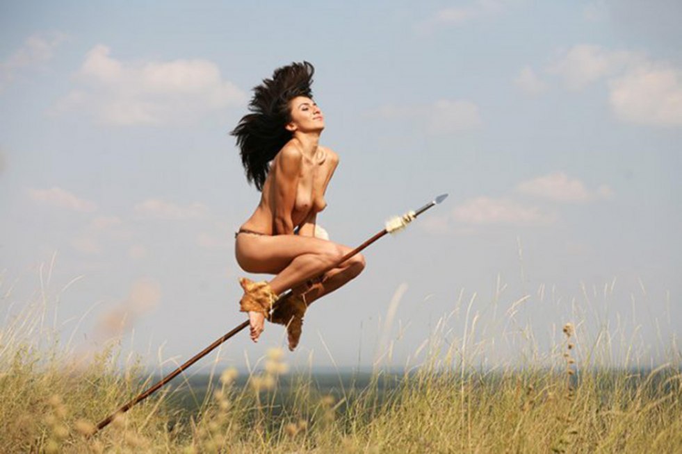 Naked witch on a broomstick