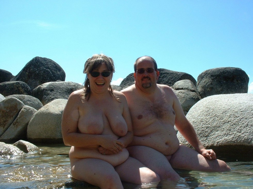 Naked fat women and men on the beach