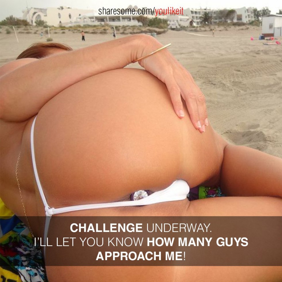 With bare ass in thong on the beach