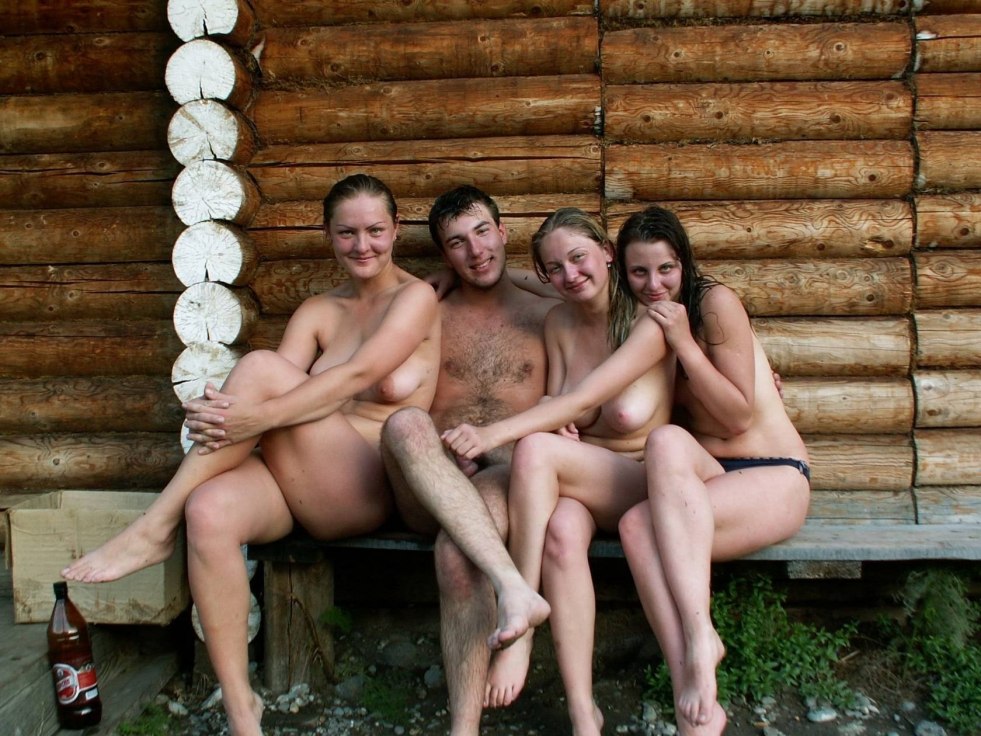 Bare women in the rustic bath