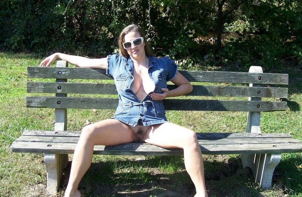 Girl on a bench without panties
