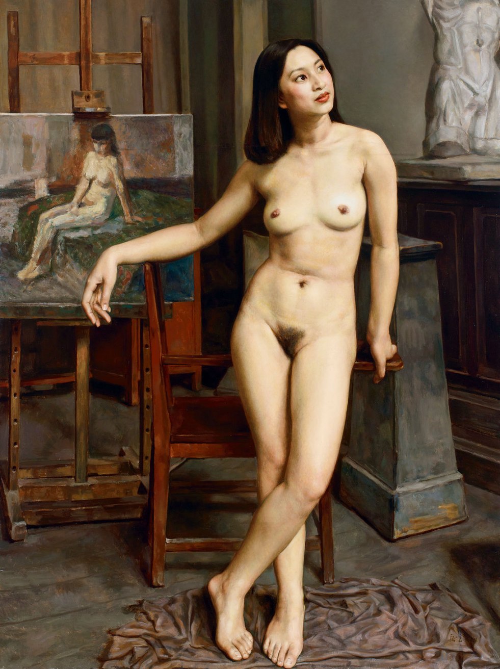 Naked women posing by an artist
