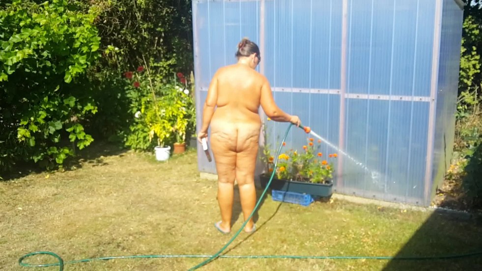 Naked at the cottage sunlight the old woman