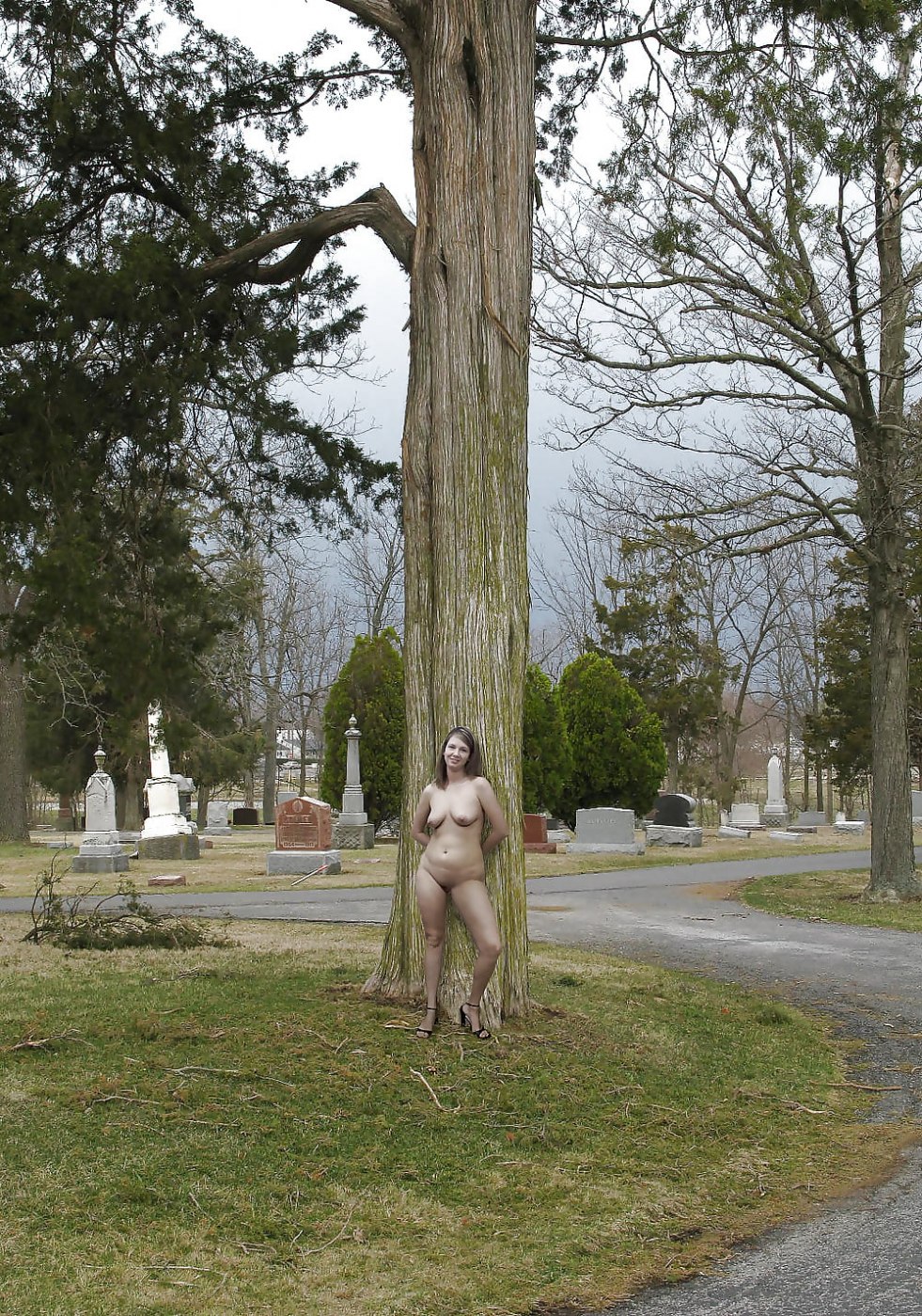 Naked witch in the graveyard