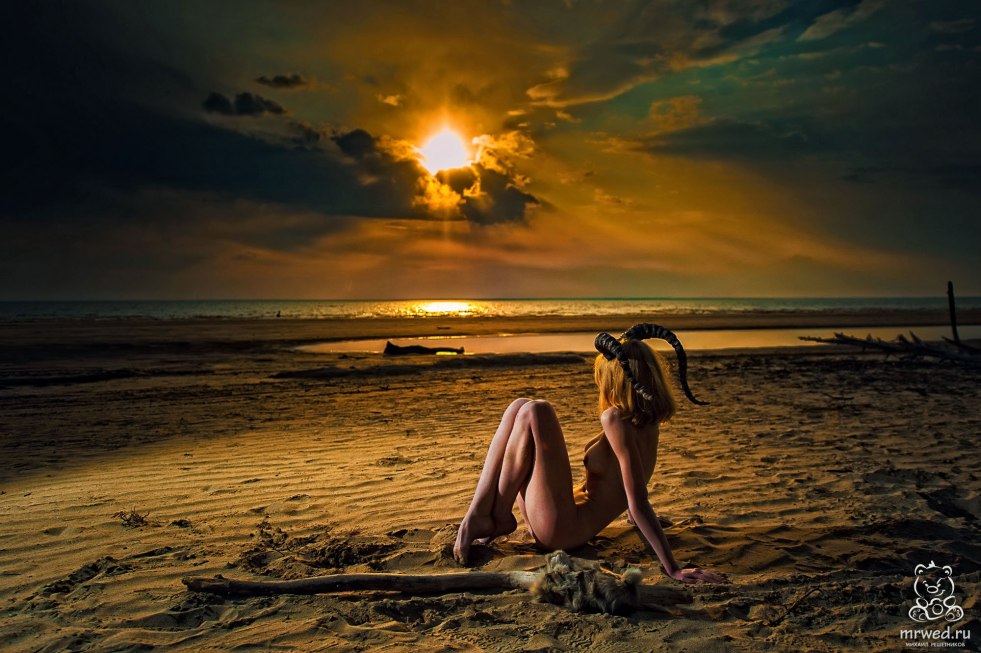 Erotic photo session at sunset