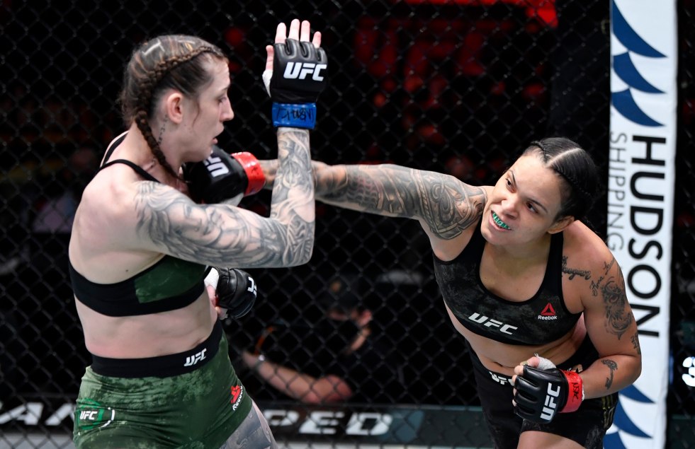 Megan Anderson against a little girl