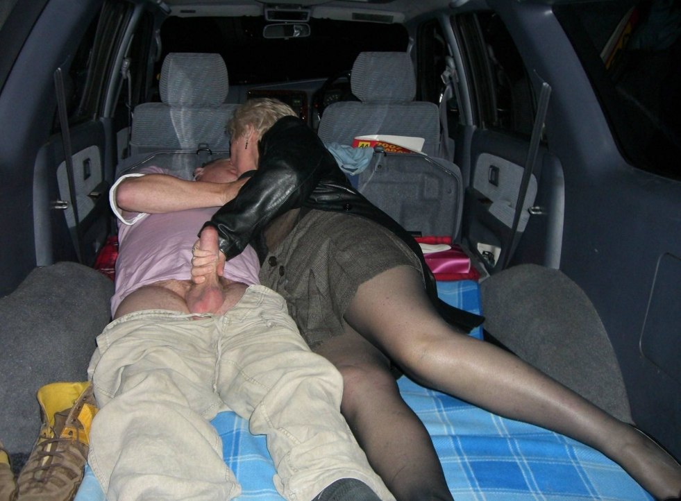 Spreads legs in the car