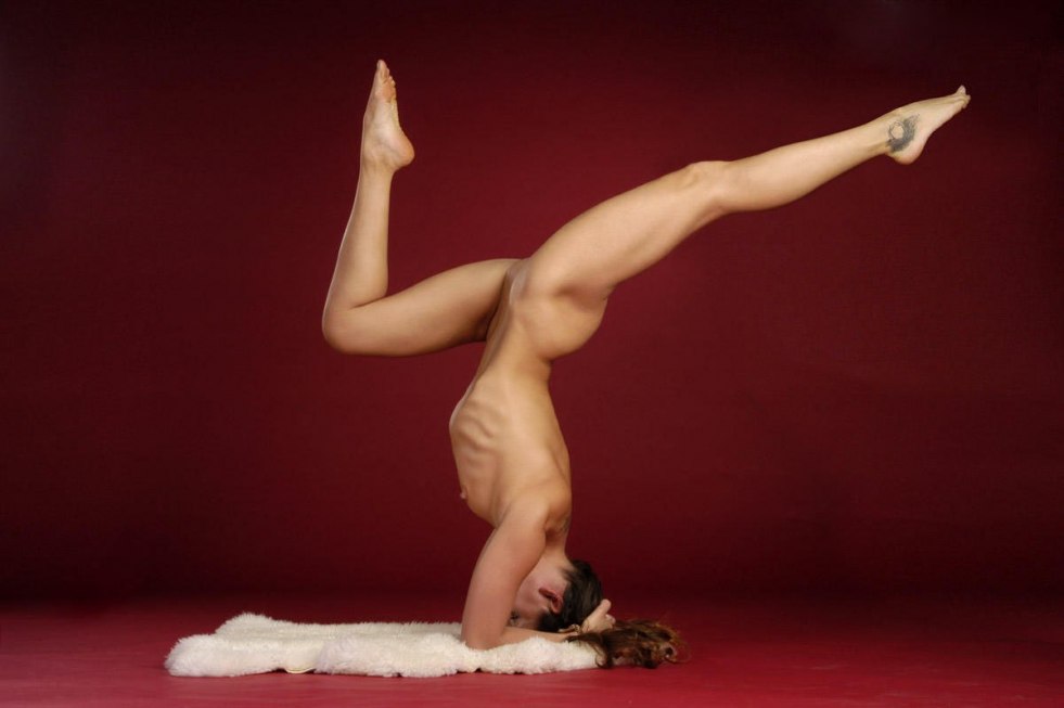 Naked gymnasts in the pose of bridge