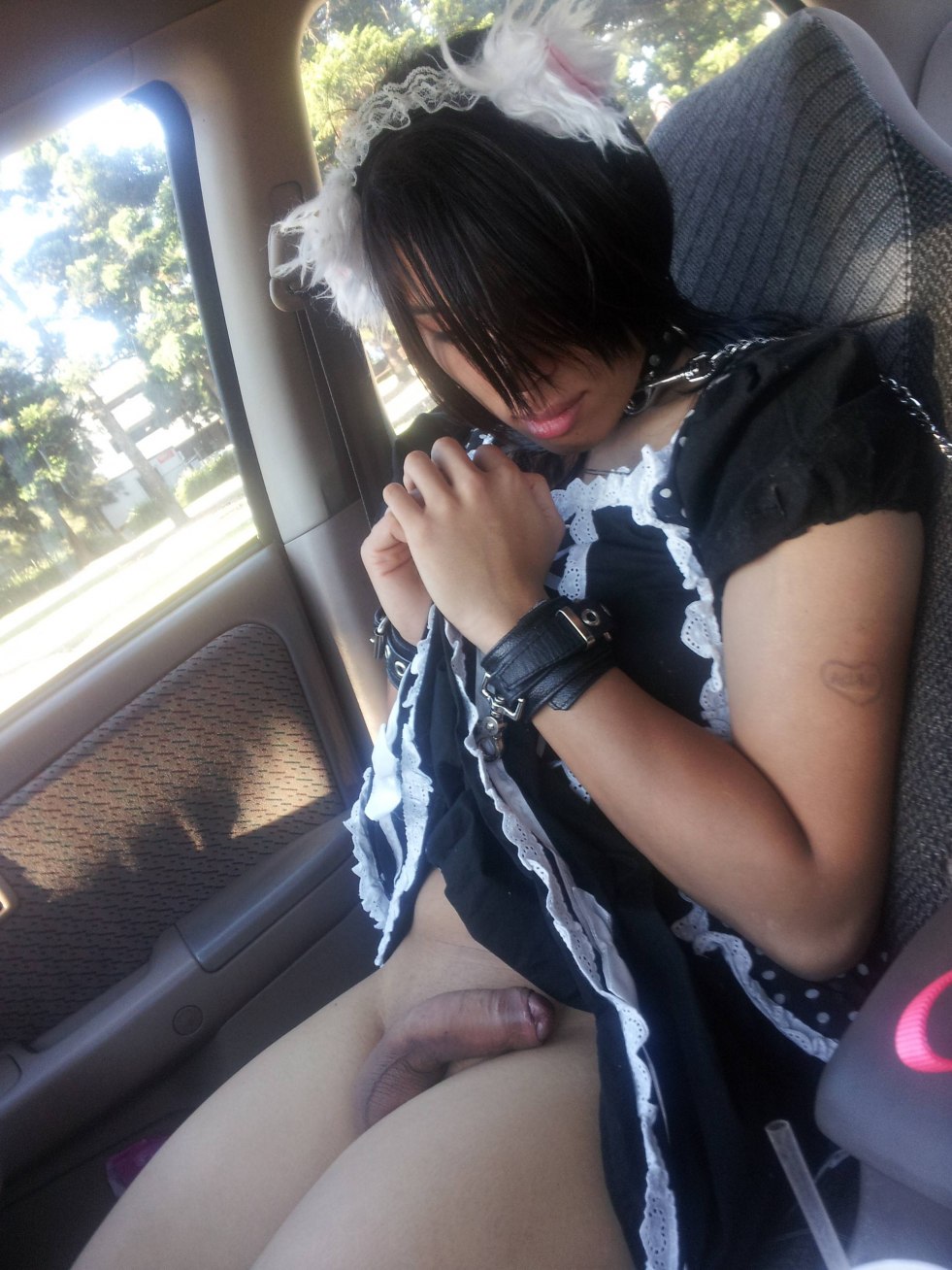 Crossdresser in the car trach