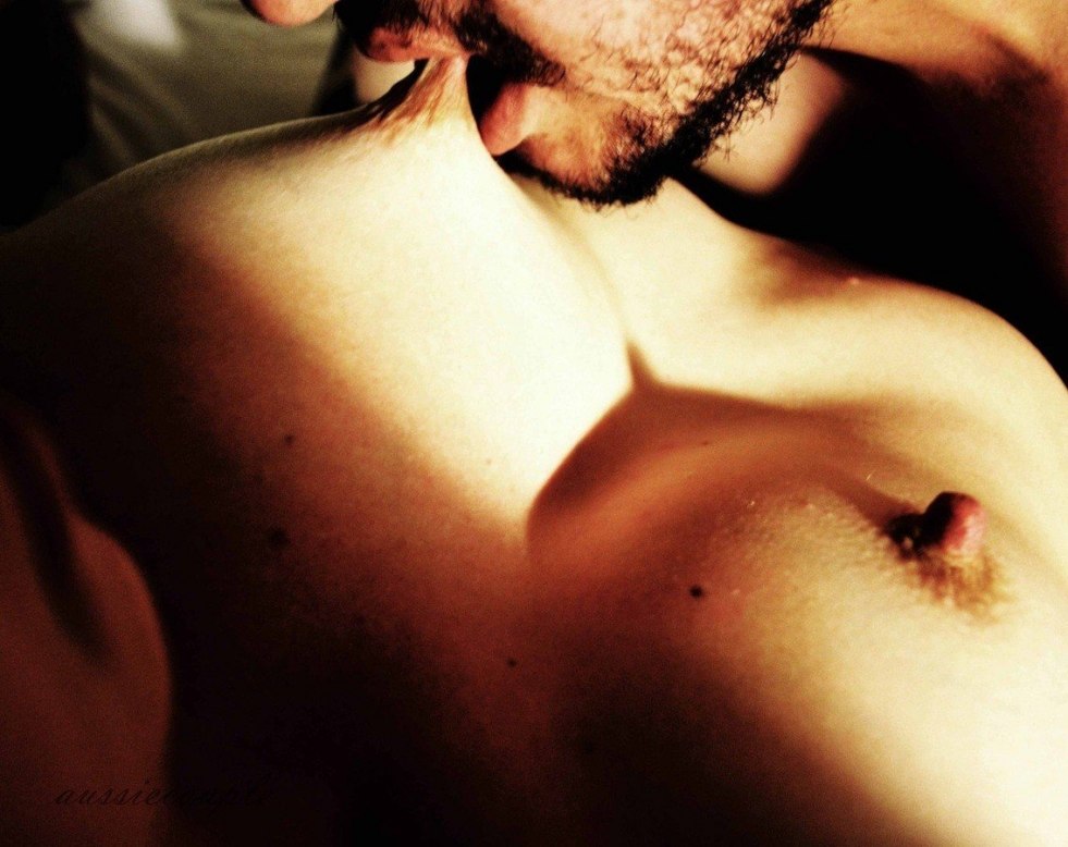 The guy kisses a girl in the chest