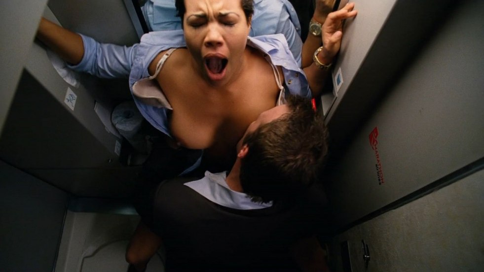 Naked stewardess in the plane