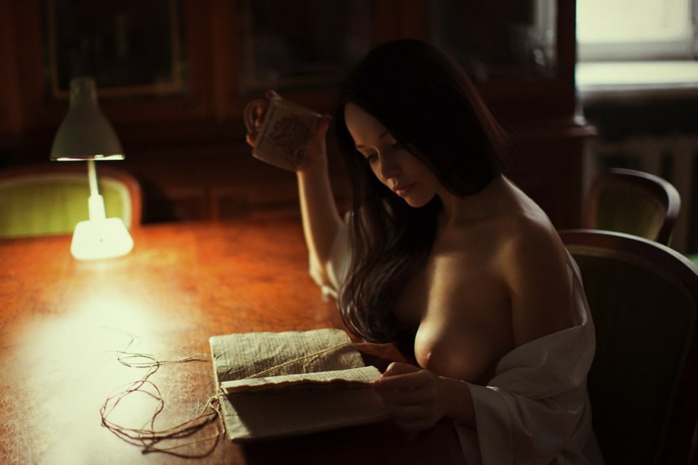 Girl with a book is exposed