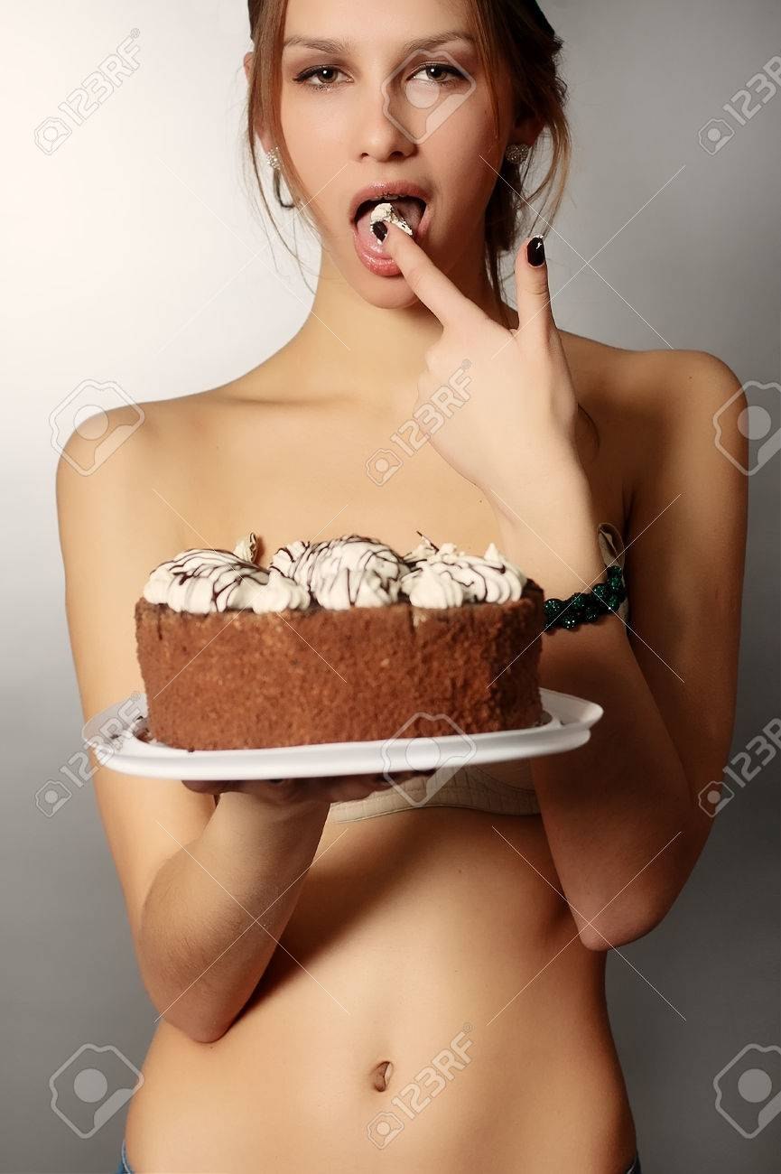 Girl erotic eats cake