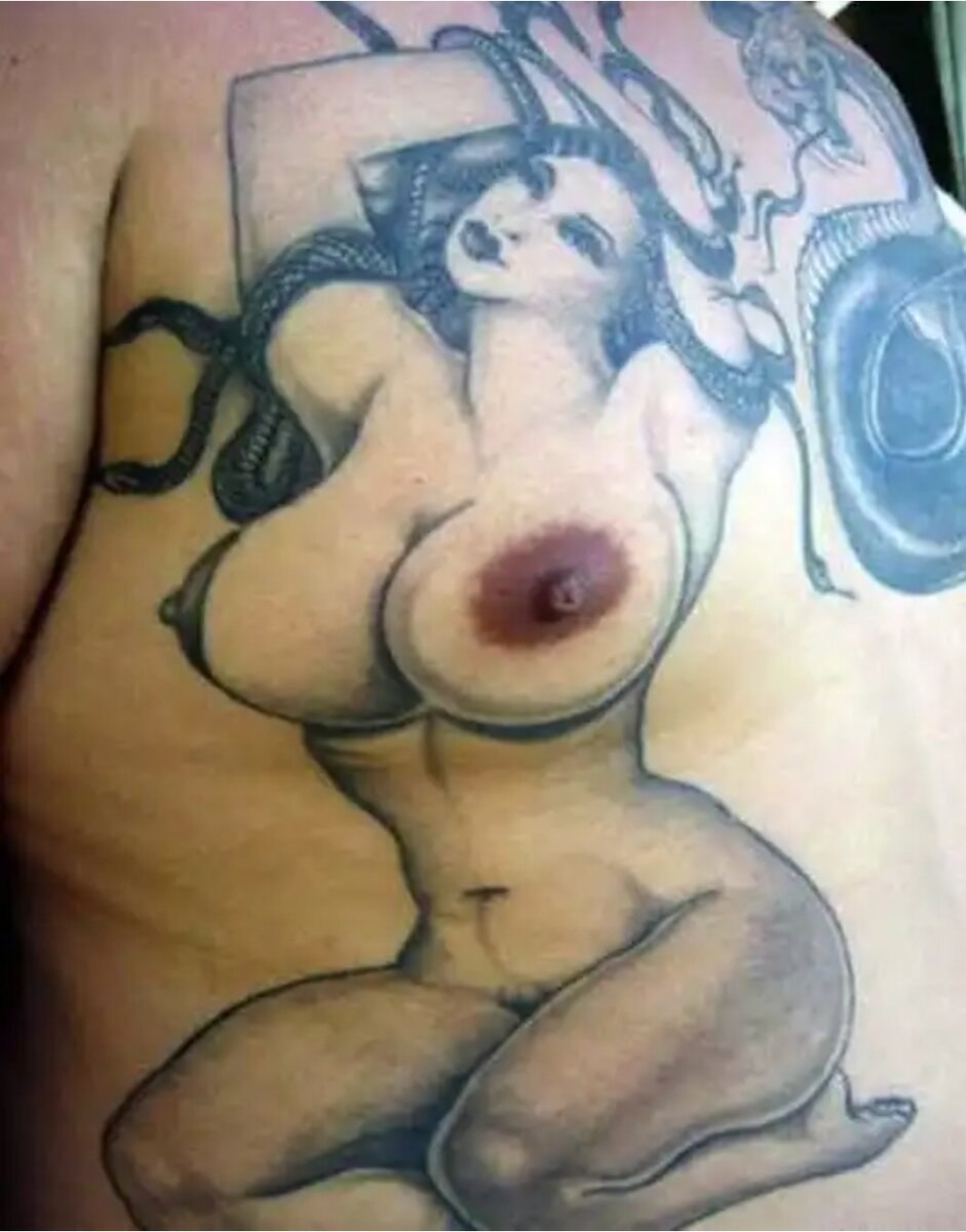 Funny tattoo on boobs