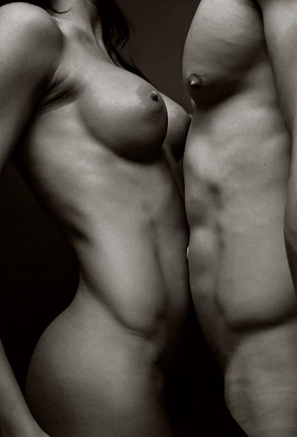 Naked man and woman standing
