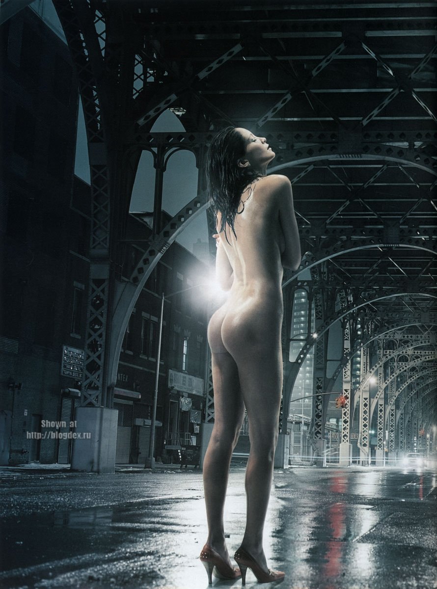 Naked woman in the night city