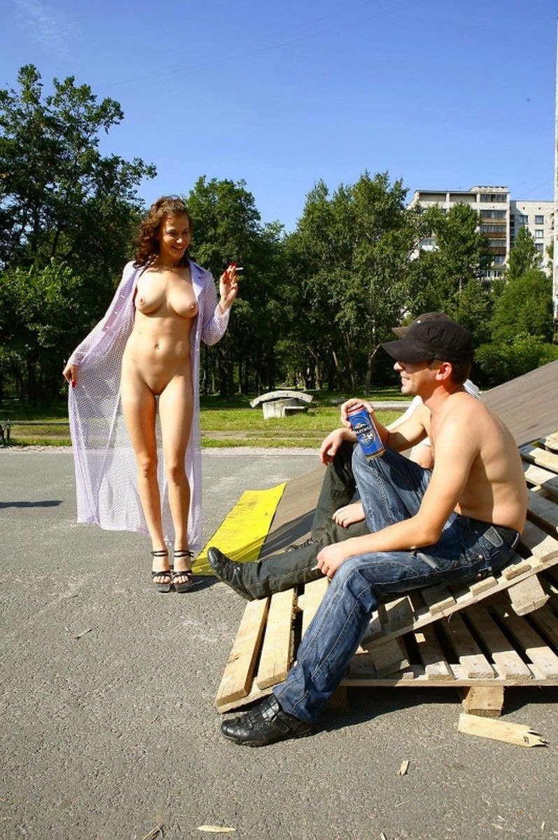 Naked woman walks around the city