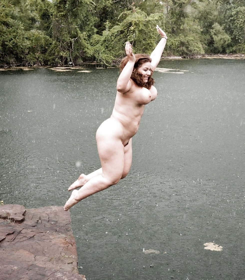 Naked girls jump into the water