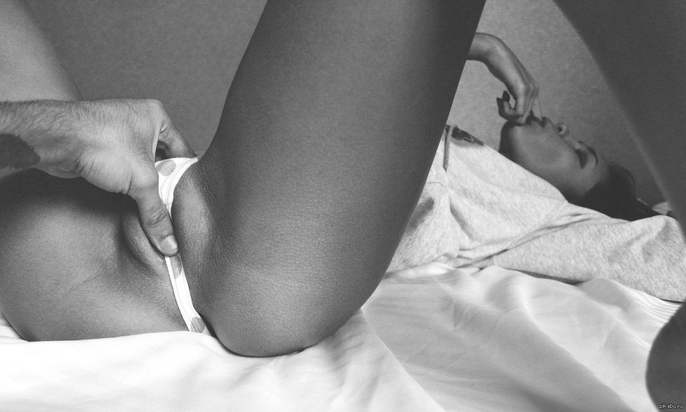 Men's hand in women's panties