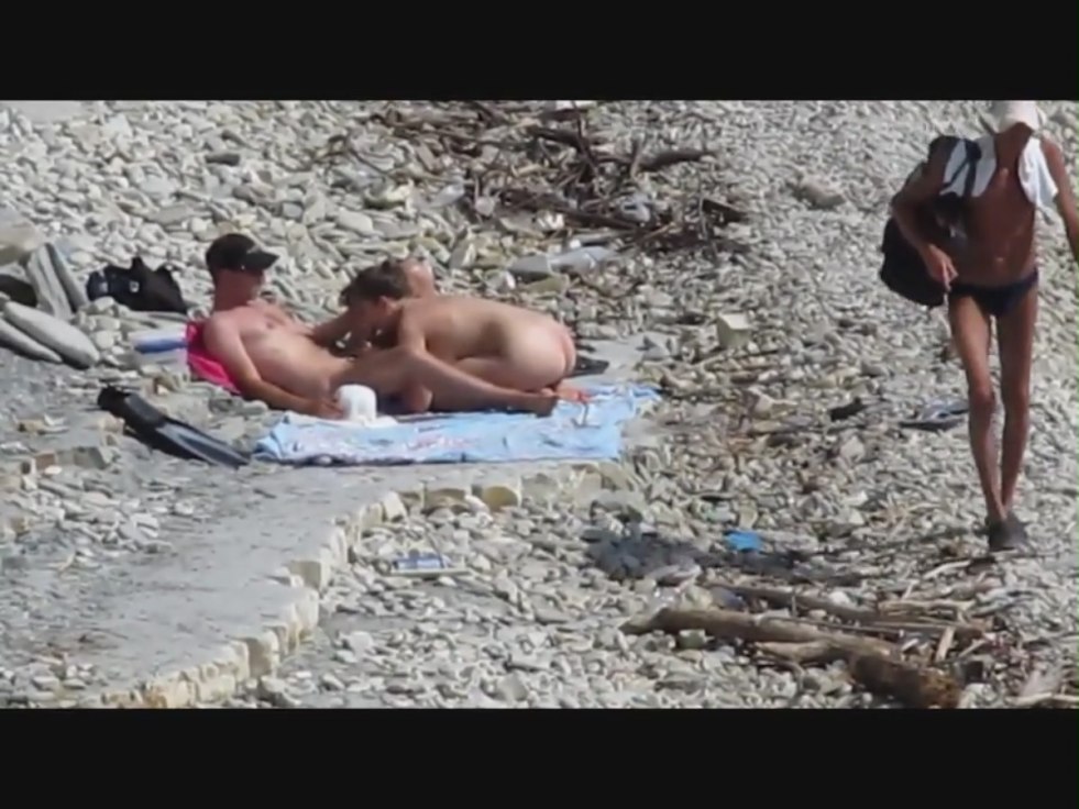Girls sunbathe on the beach in Anapa