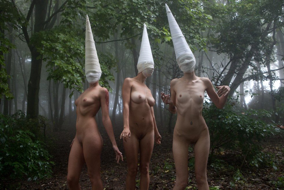 Naked beauties in masks