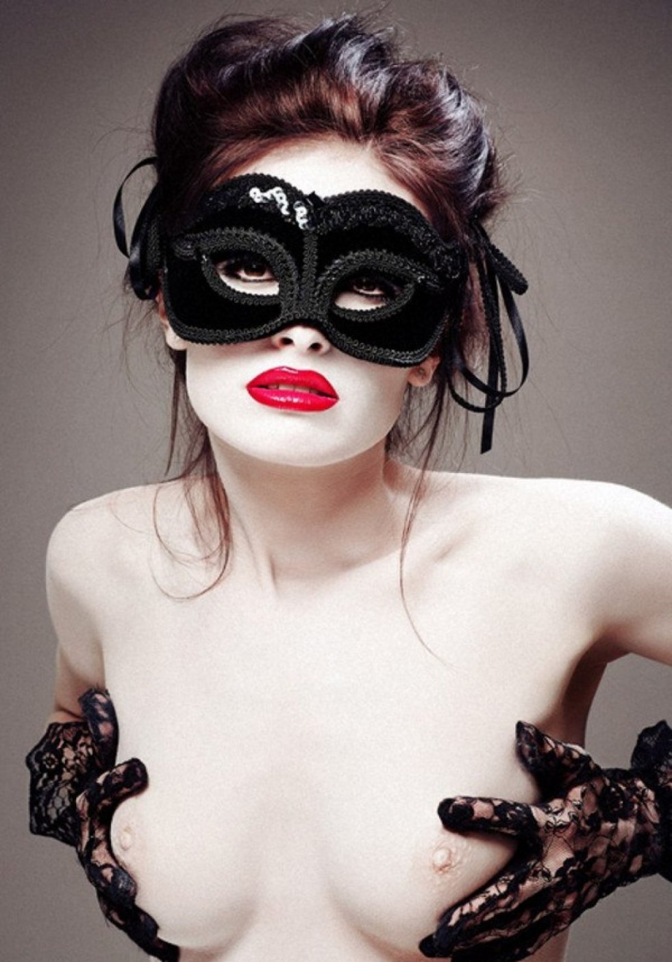 Naked beauties in masks