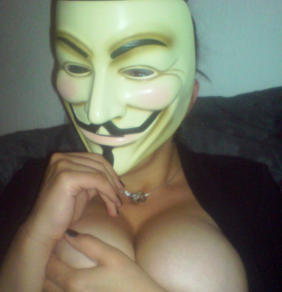 Erotic brunettes in masks