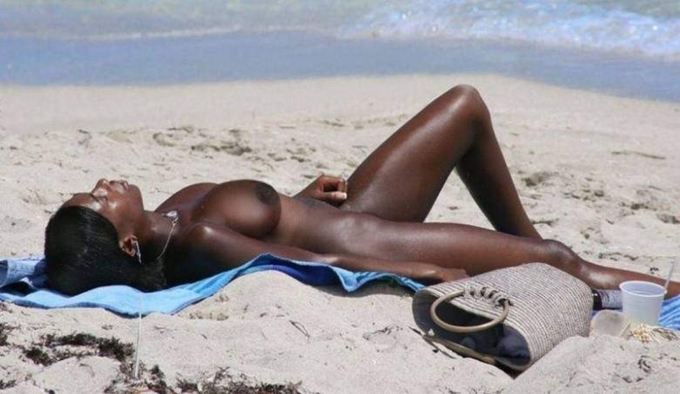 Little black women on the beach