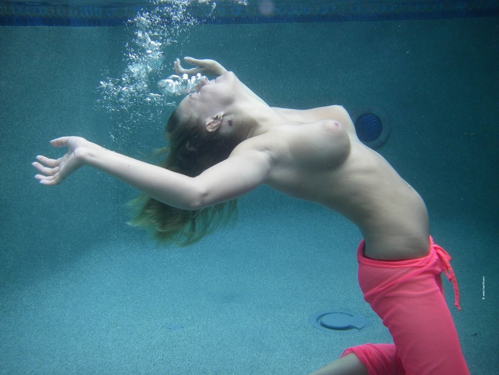 Topless girls under water