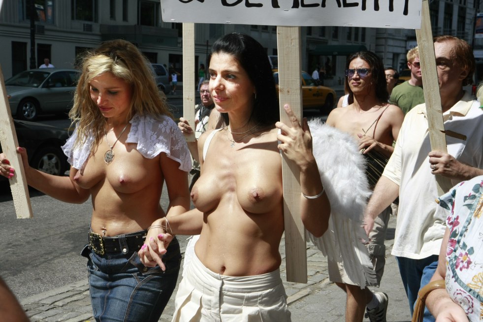 Women walk with bare tits