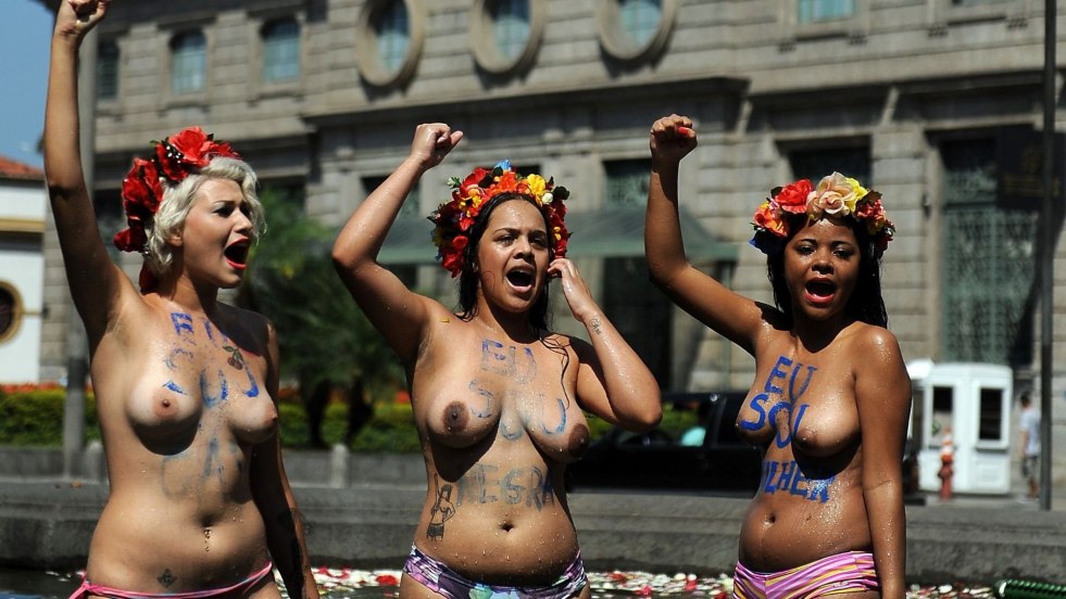 Parade of feminist with bare breasts