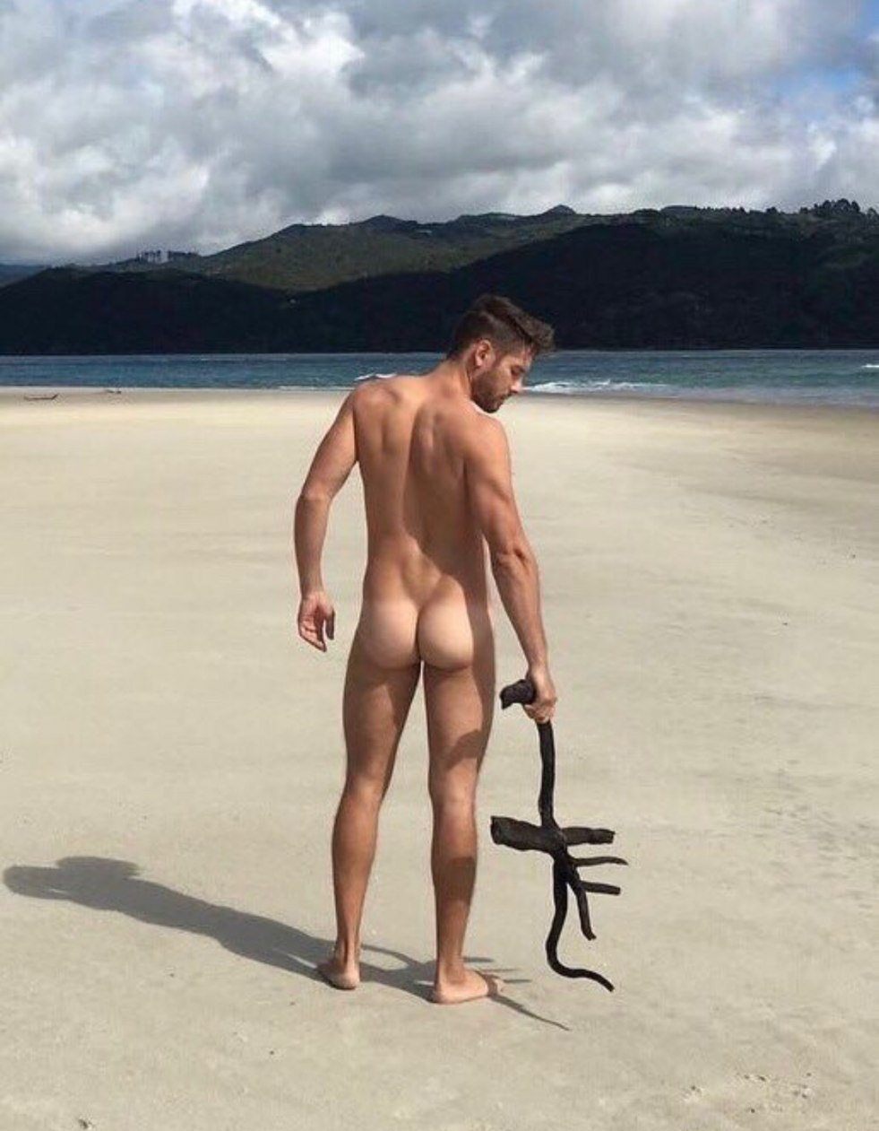 Beautiful naked guys on the beach