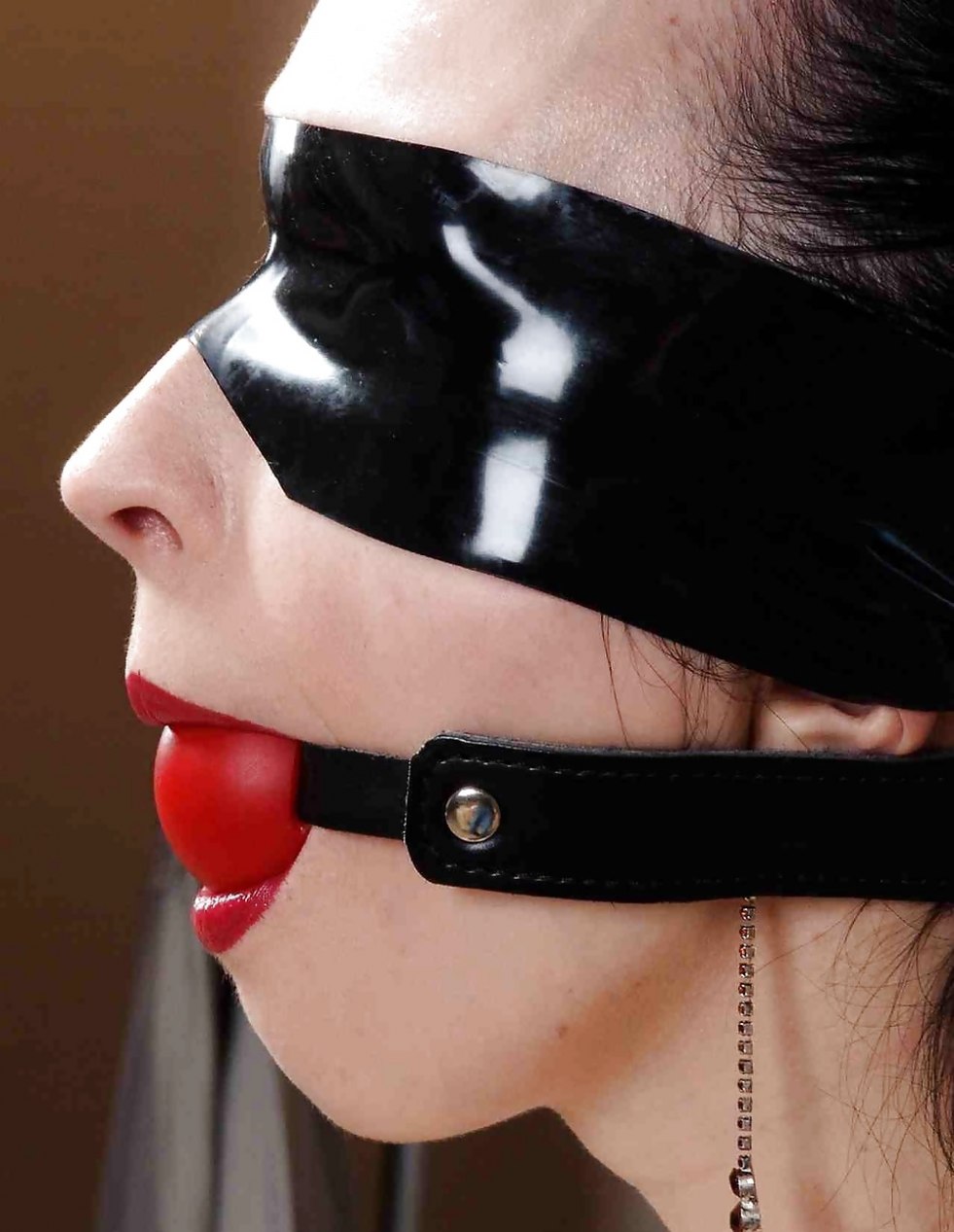 Cali Logan tied with gag