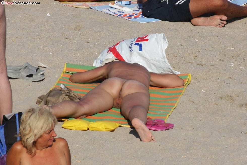 Naked women's priests on the beach